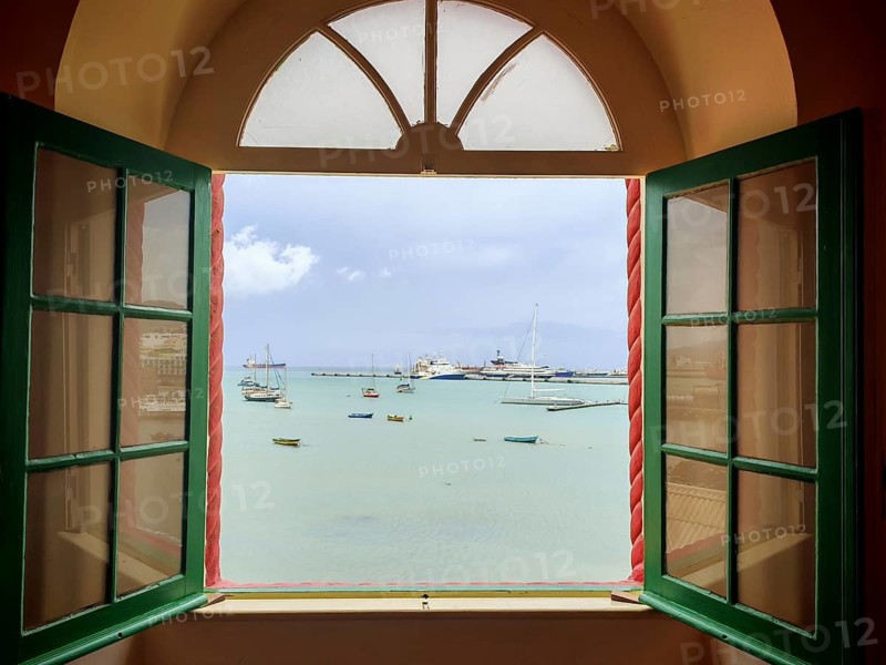 View of the sea through an open window with boats in a quiet atmosphere, Torre de Belem, Mindelo, Sao Vicente, Cabo Verde, Cape Verde, Cape Verde