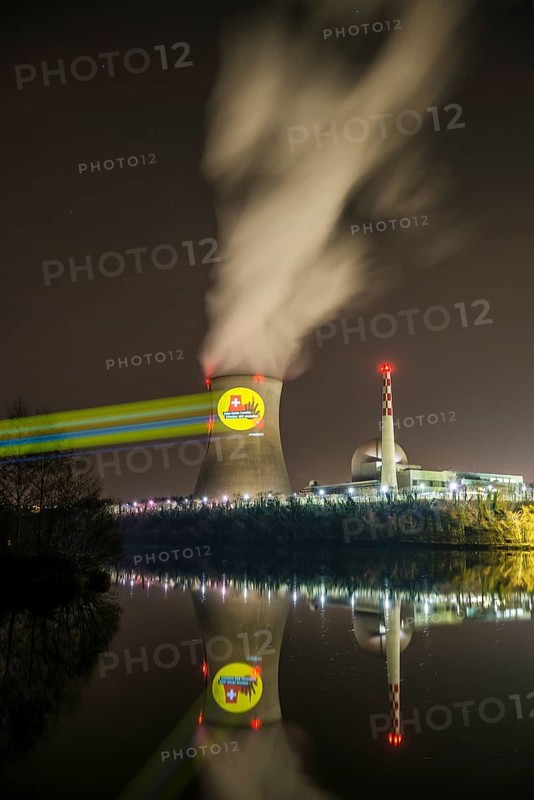 Protest action broadcast by the anti-nuclear organization, projection, night view, 05-03-2026, Waldshut, Leibstadt nuclear power plant, Rhine, Upper Rhine, Canton of Aargau, Switzerland