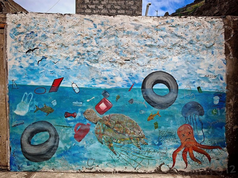 Memorial, colorful graffiti indicates ocean pollution, a mural depicts marine animals and floating trash in a surreal ocean, pollution, conservation, Formiguinhas, Cabo Verde, Cape Verde, Cape Verde, Cape Verde