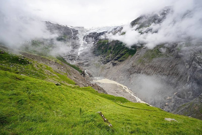 Cloudy mountain landscape with Grindelwald-Fiescherfirn glacier, Bernese Alps, Bernese Oberland, Switzerland