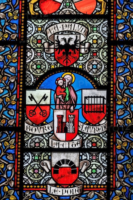 Colourful stained glass windows, Notre-Dame Cathedral, former episcopal church of the diocese of Lausanne, today the main reformed church of the city of Lausanne, canton of Vaud, Switzerland