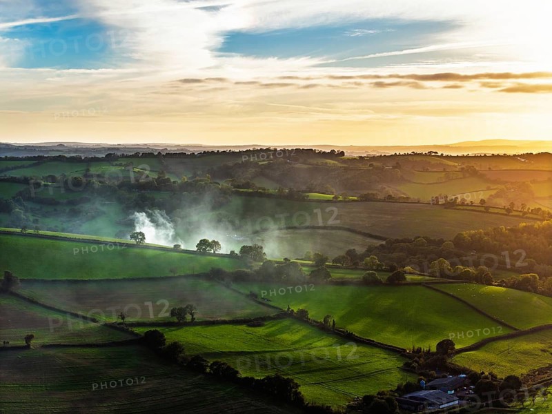 Colours of autumn Fields and Farms over Sheldon from a drone, Torbay, Devon, England, United Kingdom