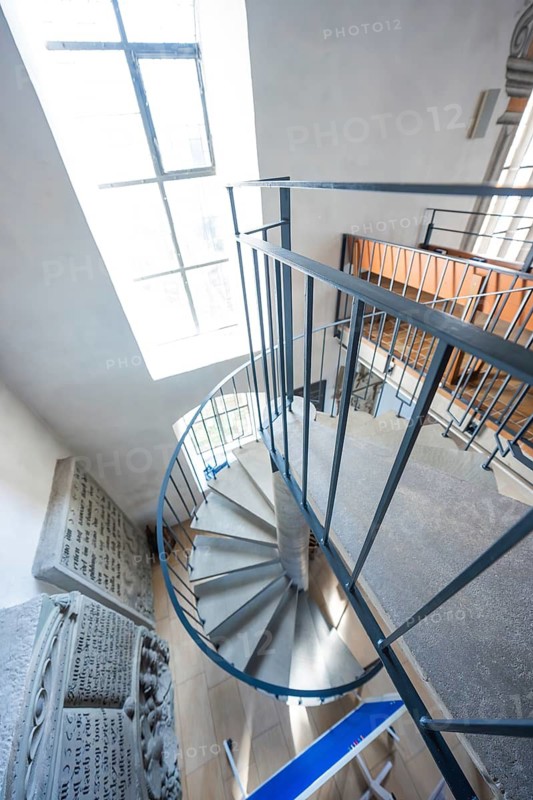 Winding staircase in a church building with light coming through a window, Deufringen, Aidlingen, Böblingen district, Germany