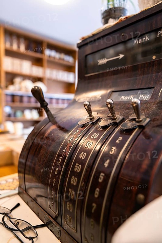 A wooden cash register with numerical display and levers in a shop, Calw Tannery Museum, Black Forest, Germany