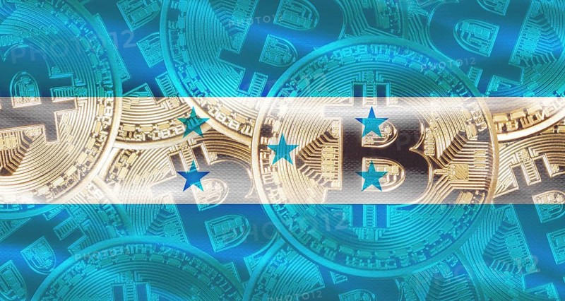 Bitcoin coins on Honduras flag background. Golden bitcoin coins on Honduras flag background
