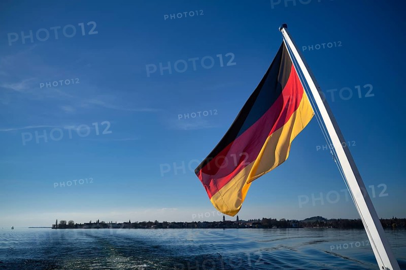 German flag, German flag, flying on ferry, Lindau behind, Bavaria, Lake Constance, Germany