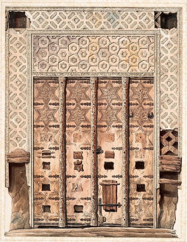 Elaborately decorated wooden door with geometric patterns and reliefs in ancient architecture
