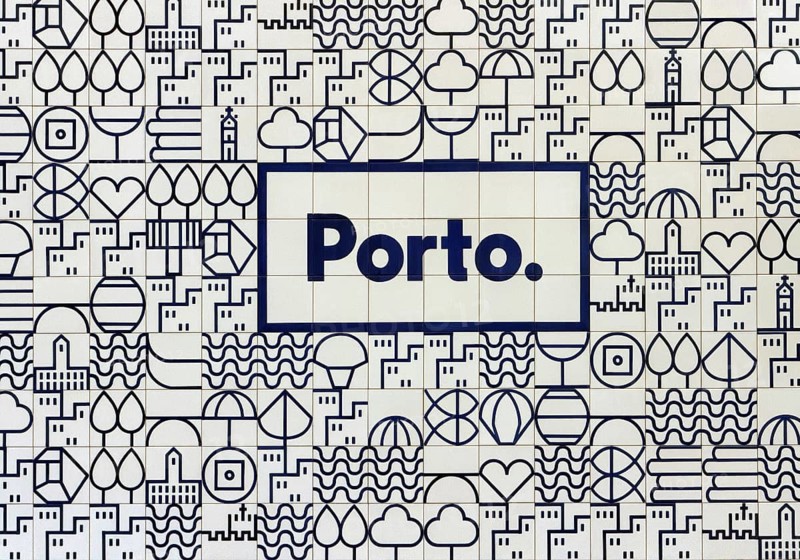 The visual identity logo of the city of Porto, a stylized illustration with blue lines against a white background designed by Studio Eduardo Aires, reminiscent of azulejo tiles