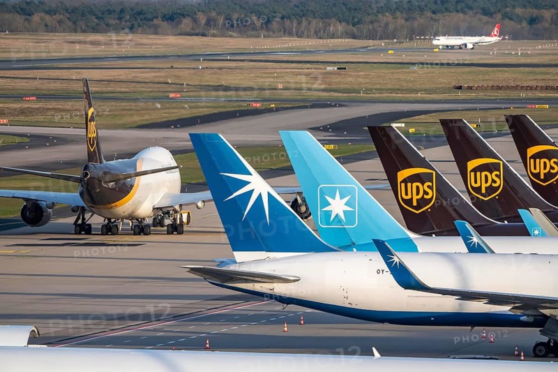 Cologne-Bonn airport, CGN, UPS Boeing 747-8F, cargo plane after landing, on the taxiway to the air freight center, UPS Logisic Hub, Star Air, Maersk cargo planes on the apron