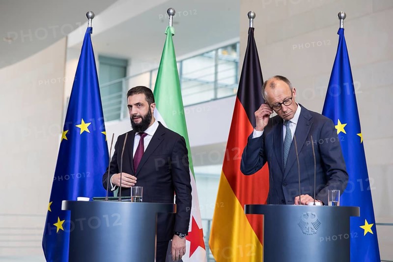 Ahmed al-Sharaa (President of the Syrian Arab Republic) and Friedrich Merz (Chancellor of the Federal Republic of Germany, CDU) at a press conference after a one-on-one meeting at the Federal Chancellery, Berlin, 30 March 2026