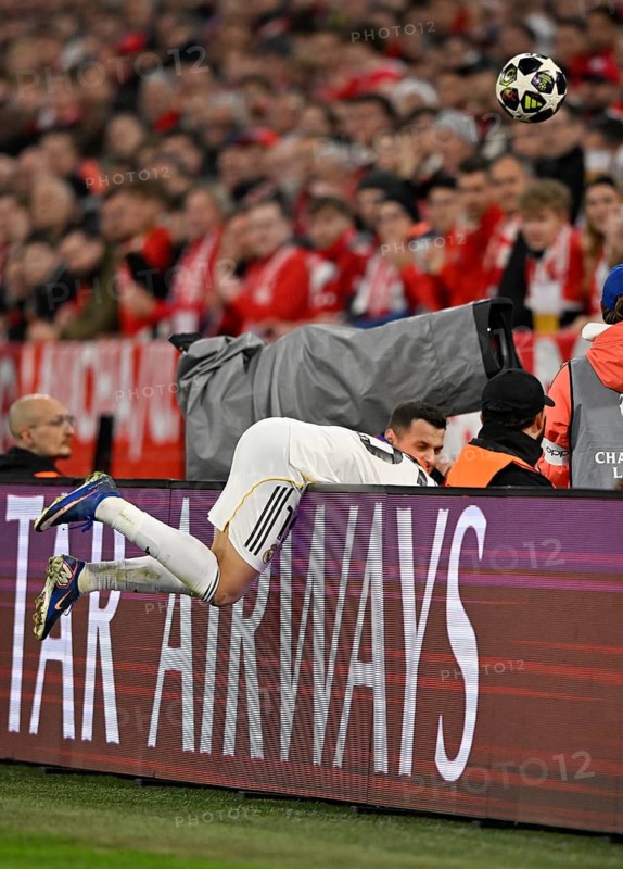 Arda Güler Real Madrid (15) flies over the advertising hoarding Football UEFA Champions League CL Allianz Arena, Munich, Bavaria, Germany