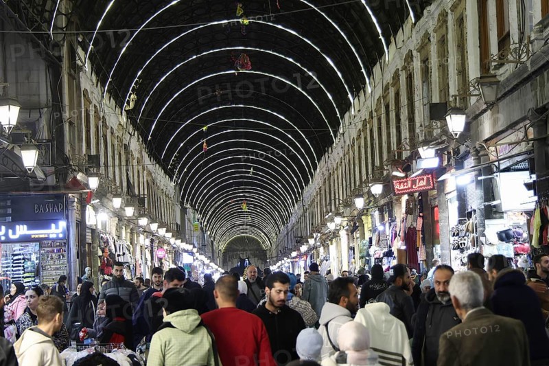 Syrians shop at the historic Al-Hamidiyah Bazaar adjacent to the Umayyad Mosque during the early days of Ramadan in Damascus, Syria on February 18, 2026, Damascus, Syria