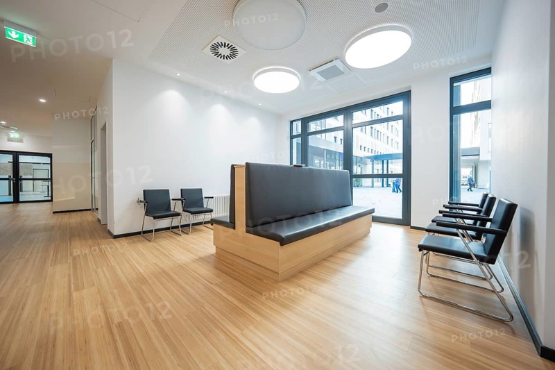 Modern waiting room with wooden floors and minimalist furniture, radiology in the new health campus, Calw, Germany