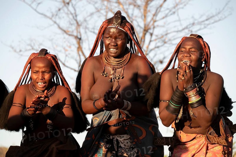 Himba woman dancing euphorically, traditional dance, traditional Himba village, Kaokoveld, Kunene, Namibia