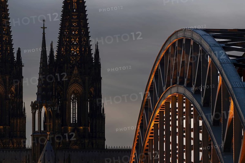 Evening atmosphere, Cologne Cathedral illuminated with LED lamps and the Hohenzollern Bridge, Cologne, North Rhine-Westphalia, Germany
