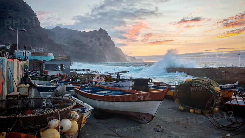 Harbour with fishing boats and big waves at sunset, Ponta do Sol, Santo Antao, Cabo Verde, Cape Verde