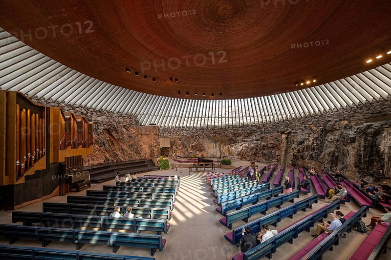 Temppeliaukio Church (Finnish: Temppeliaukion kirkko, Swedish: Tempelplatsens kyrka), modern rock-hewn church, architects Timo and Tuomo Suomalainen, Etu-Töölö district, Helsinki