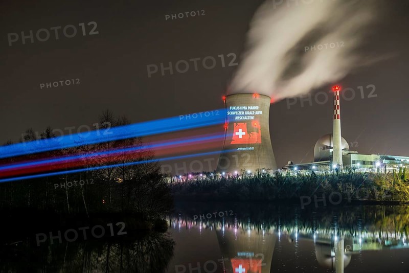 Protest action broadcast by the anti-nuclear organization, projection, night view, 05-03-2026, Waldshut, Leibstadt nuclear power plant, Rhine, Upper Rhine, Canton of Aargau, Switzerland