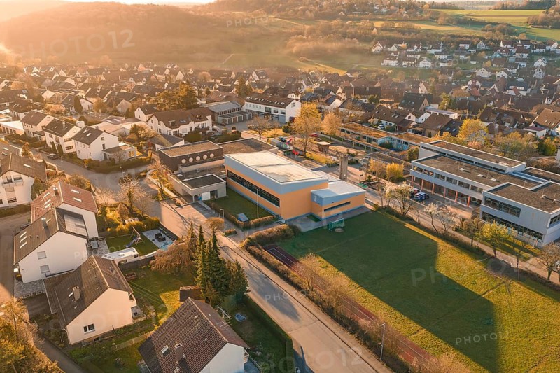 Residential and school buildings in a village setting with autumn surroundings, Schlehengäuschule, Gechingen, Hecken and Gäu region, Calw district, Germany