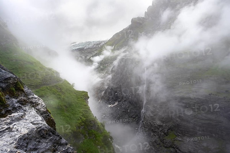 Cloud-covered mystical rock gorge with waterfalls, hike to Berghaus Bäregg, Bernese Alps, Bernese Oberland, Switzerland