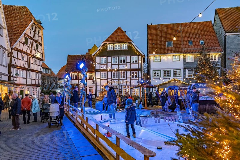 Curling at the Christmas market and timbering in Soest at dusk, North Rhine-Westphalia, Germany