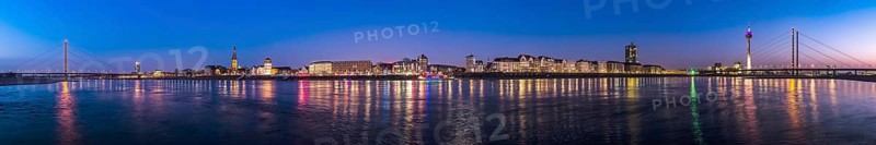 Panorama of the city of Düsseldorf, old town with Rhine bridges and television tower, night shot, Düsseldorf, Germany