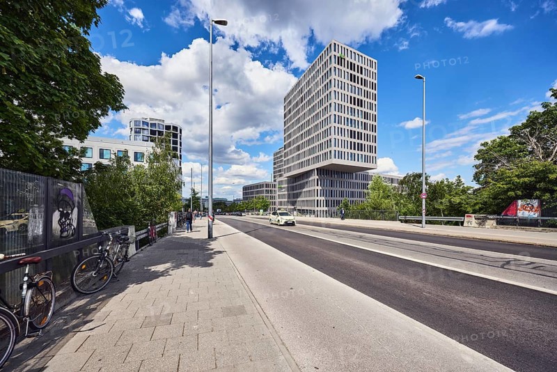 Group headquarters Flix SE, Flixbus, Flixtrain, general architecture, commercial building, high-rise building, modern buildings, sidewalk, street, lantern, bicycles, taxi, trees, blue sky, cumulus clouds, Friedenheimer bridge, Munich, state capital, district-free city, Bavaria, Germany