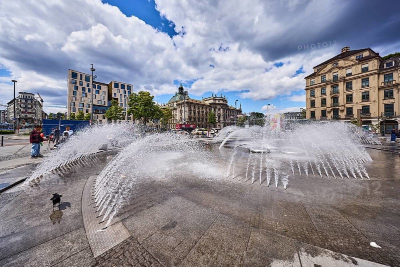 Fountain, water fountain, general architecture, residential and commercial buildings, Stachus roundel, neo-baroque style, pedestrian zone, blue sky, white and dark gray cumulus clouds, Stachus, Karlsplatz, Munich, state capital, district-free city, Bavaria, Germany