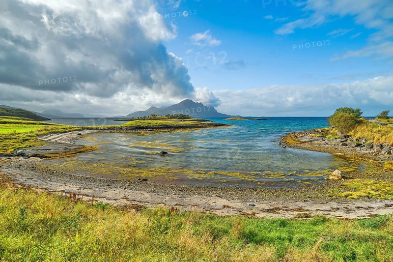 On Litlversvika beach, sea, clouds and blue sky, soft light, Helgeland, Nordland, Arctic Circle, Scandinavia, Rødøy, Norway