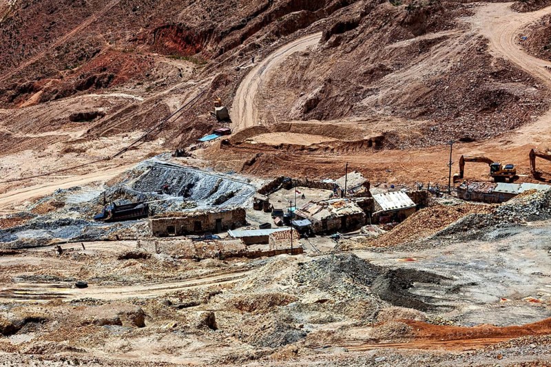 Extensive view of a quarry landscape with huts and machinery, The silver mines of Potosi on Cerro Rico in Bolivia
