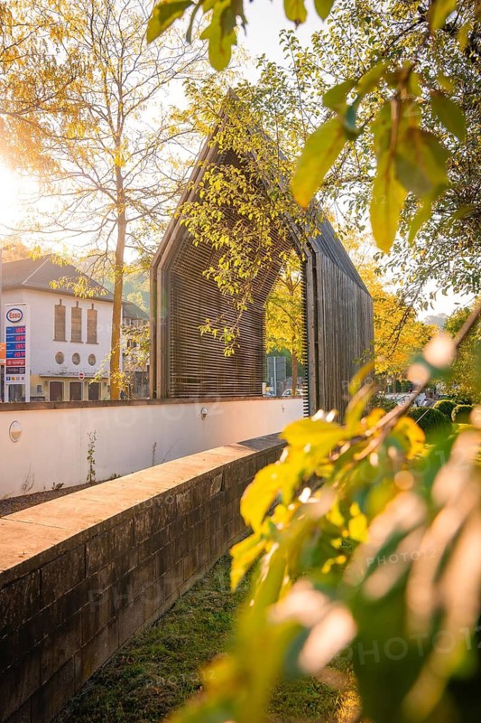 Artistic gate in the municipal park during autumn in the morning, Calw, Black Forest, Germany