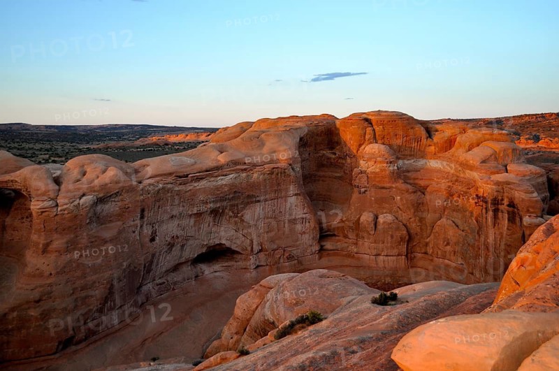 Majestic sandstone formations at sunset in a desert landscape, Arches National Park, Utah, USA
