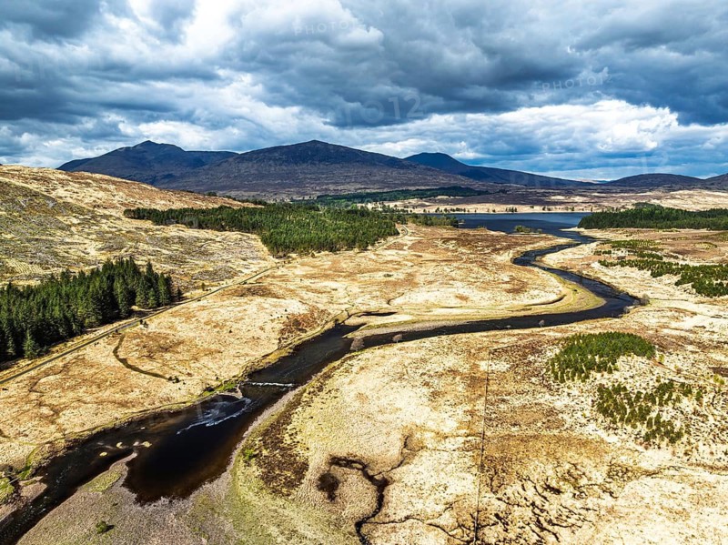 Mountains and Moors over Loch Tulla and River Orchy from a drone, Highlands, Scotland, UK