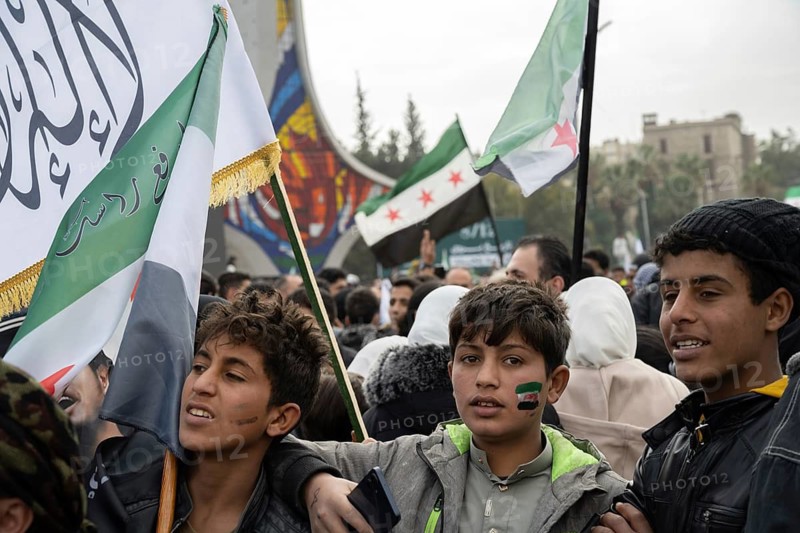 Damascus, Syria. December 8th 2025. Syrians gathering in Umayyad Square in central Damascus to celebrate one year since the fall of the Assad regime, damascus, Syria