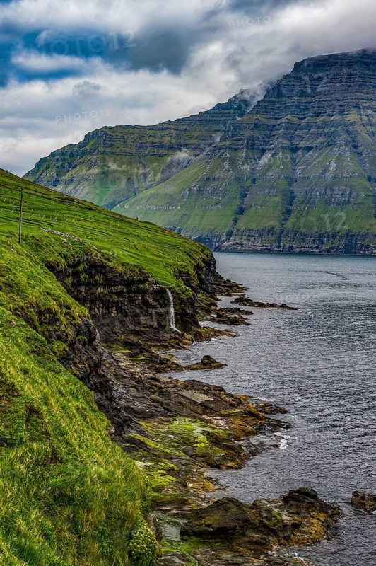 Waterfall into the ocean, Bordoy, Faroe islands, Denmark