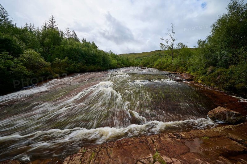 Fast-flowing river in the middle of a forest under cloudy sky, Victoria Falls, Slattadale, Achnasheen, Scotland, United Kingdom, Great Britain