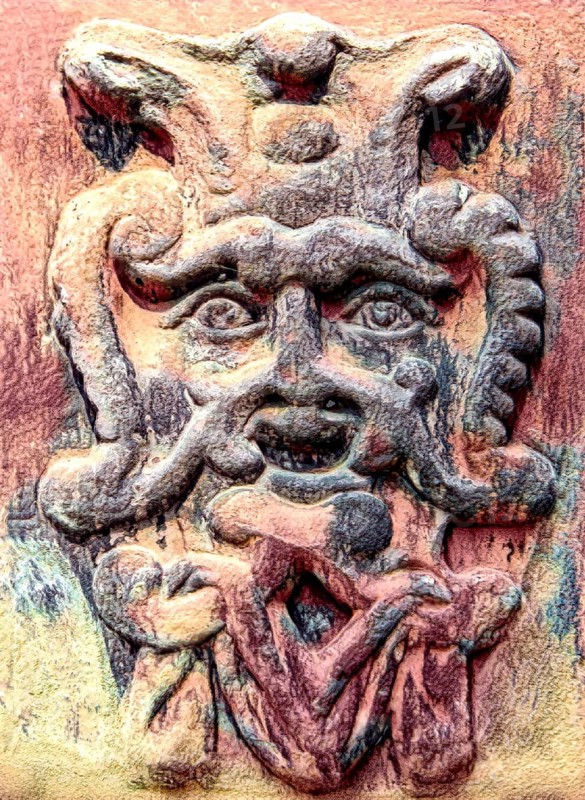 Old stone mask, face on a wall, Welf Castle of Herzberg, Herzberg am Harz, district of Göttingen, Lower Saxony, Germany, digitally edited