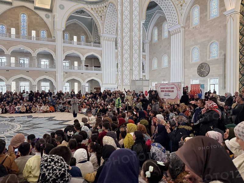 Dozens of Muslim children participate in indoor entertainment event inside a grand mosque during the Eid al-Fitr celebrations celebrated by Muslims in the Middle East and around the world in Gaziantep, Turkey on March 28, 2026, Gaziantep, Turkey