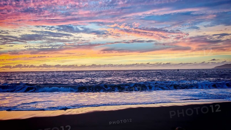 Purple-pink ocean cloudscape at sunset with soft waves, romantic, Tarrafal de Monte Trigo, Santo Antao, Cabo Verde, Cape Verde, Cape Verde