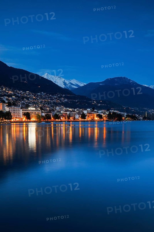 Lake basin of Locarno at dusk, snow-covered Pizzo Vogorno in the background, Canton Ticino, Switzerland