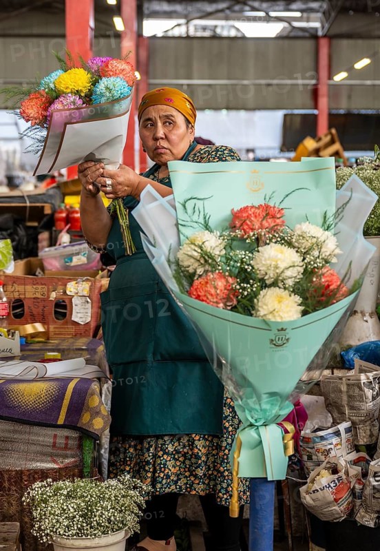 Flower seller at the Osh Bazaar, Bishkek, Kyrgyzstan