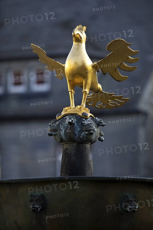 Gilded imperial eagle as a fountain eagle on the market fountain, Old Town, Goslar, UNESCO World Heritage Site, Lower Saxony, Germany