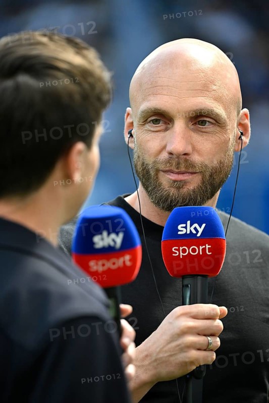 Sports Director Ole Book Borussia Dortmund BVB Portrait in an interview microphone Mikro Logo SKY soccer Bundesliga, PreZero Arena, Sinsheim, Baden-Württemberg, Germany