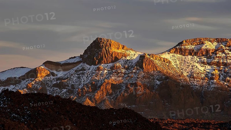 Mirador El Tabonal Negro, caldera, rocks and mountains illuminated by the sun in the golden hour, Teide, Parque Nacional del Teide, Teide National Park, volcano, volcanism, UNESCO World Heritage Site, Tenerife, Canary Islands, Spain