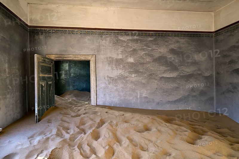 Former dwelling house full of sand, Kolmanskop, restricted diamond area, Karas region, Namibia