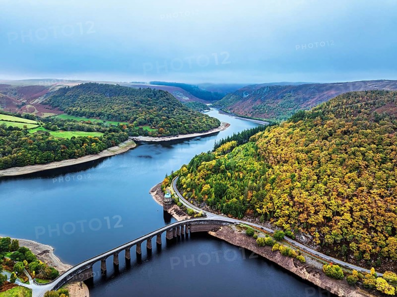 Autumn over Garreg Ddu Dam from a drone, Elan Valley, Caban-Coch Reservoir, Rhayader, Wales, UK