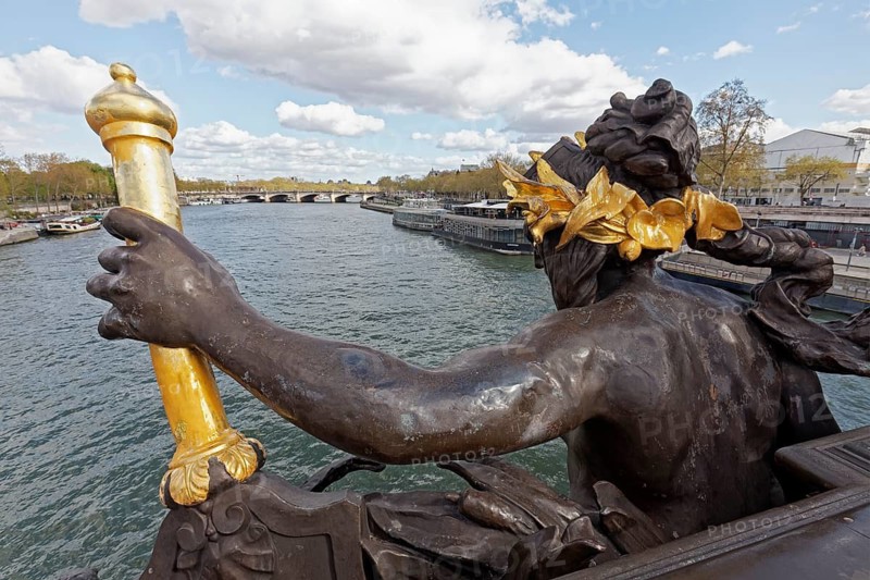 Goddess of fame with sceptre on Pont Alexandre III across the Seine, Beaux Arts style renown, Paris, France