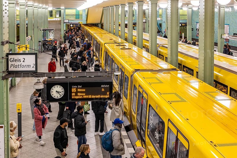 Alexanderplatz railway station in Berlin. Railway platform with people and subway. Berlin, Germany