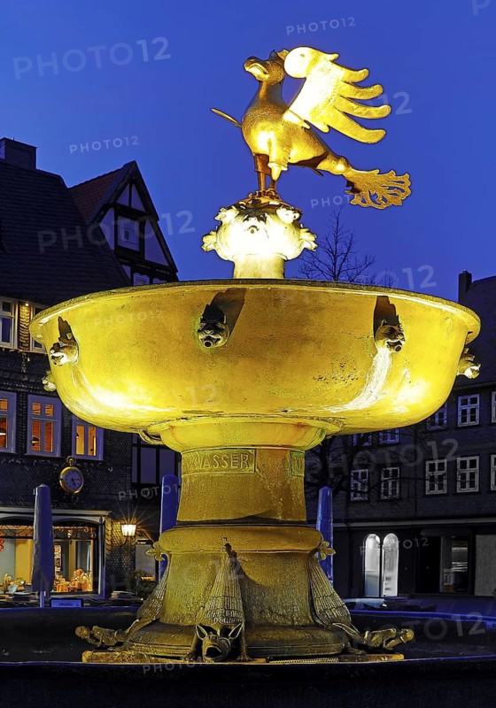 Gilded imperial eagle as a fountain eagle on the market fountain in the evening, Goslar, UNESCO World Heritage Site, Lower Saxony, Germany