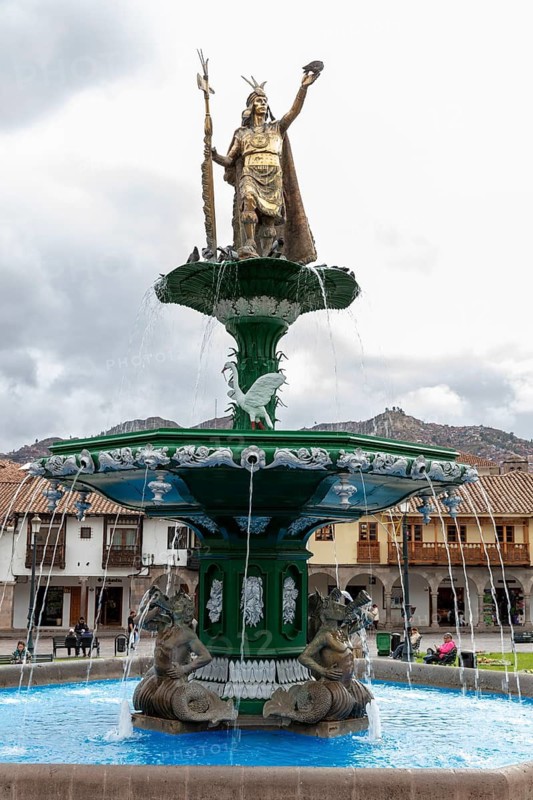 King of the Incas Pachacutec over fountain in Plaza de Armas, Cusco, Peru